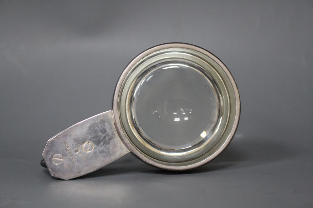 A silver plate mounted desk magnifying glass with horses head handle, retailed by Hermes, Paris,